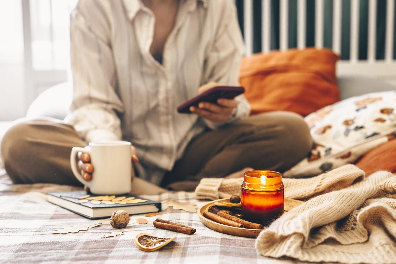 Woman-on-phone-holding-coffee