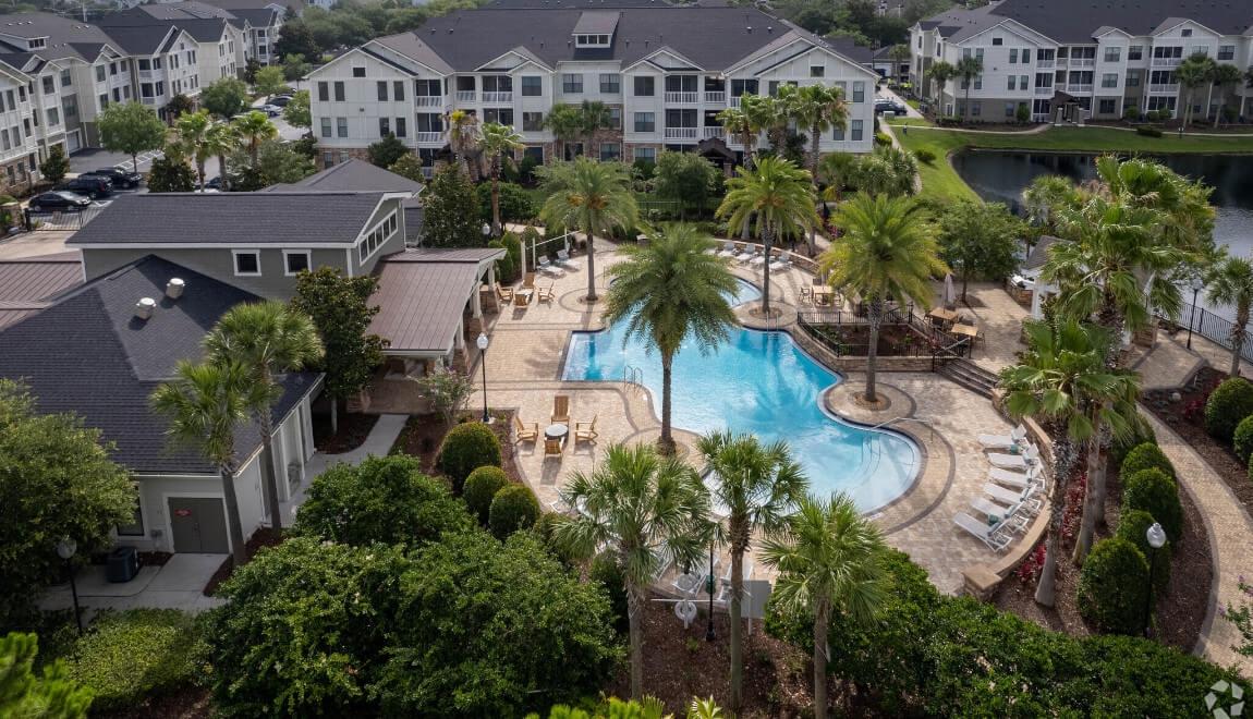 Aerial view of the pool and lake at Terraces at Town Center in Jacksonville, FL.