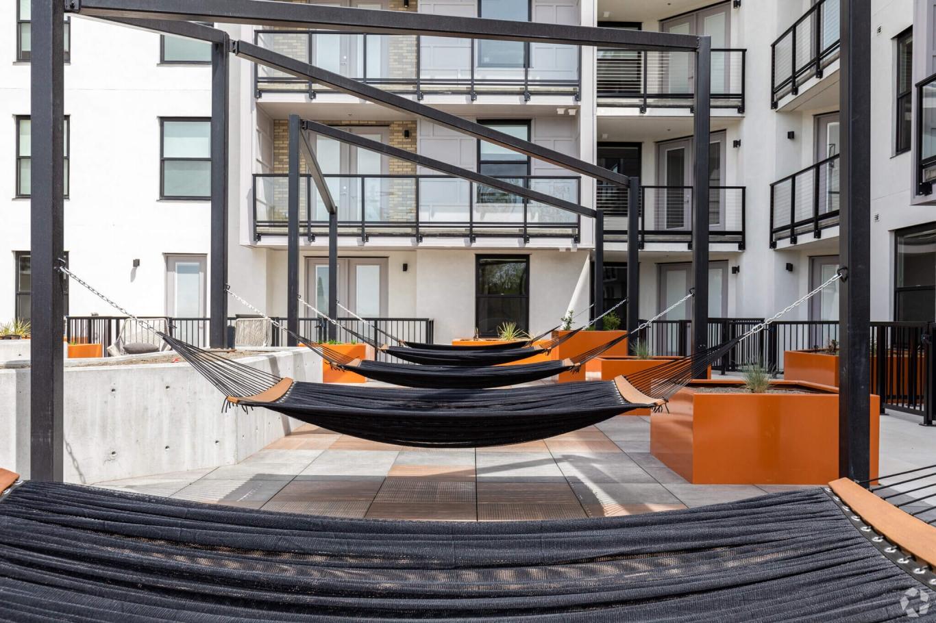 Hammocks on the balcony at Regius Square in Salt Lake City.