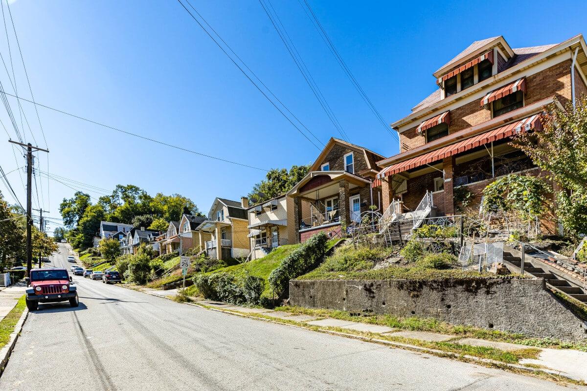 Colorful houses sit on the rolling hills in Beechview.