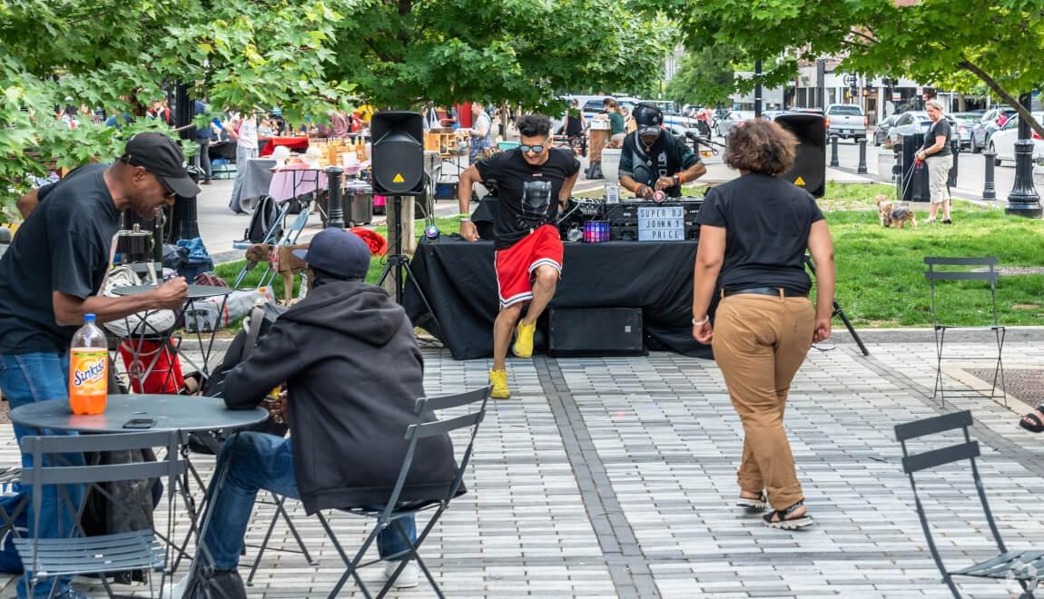 Person dancing in downtown Evanston 