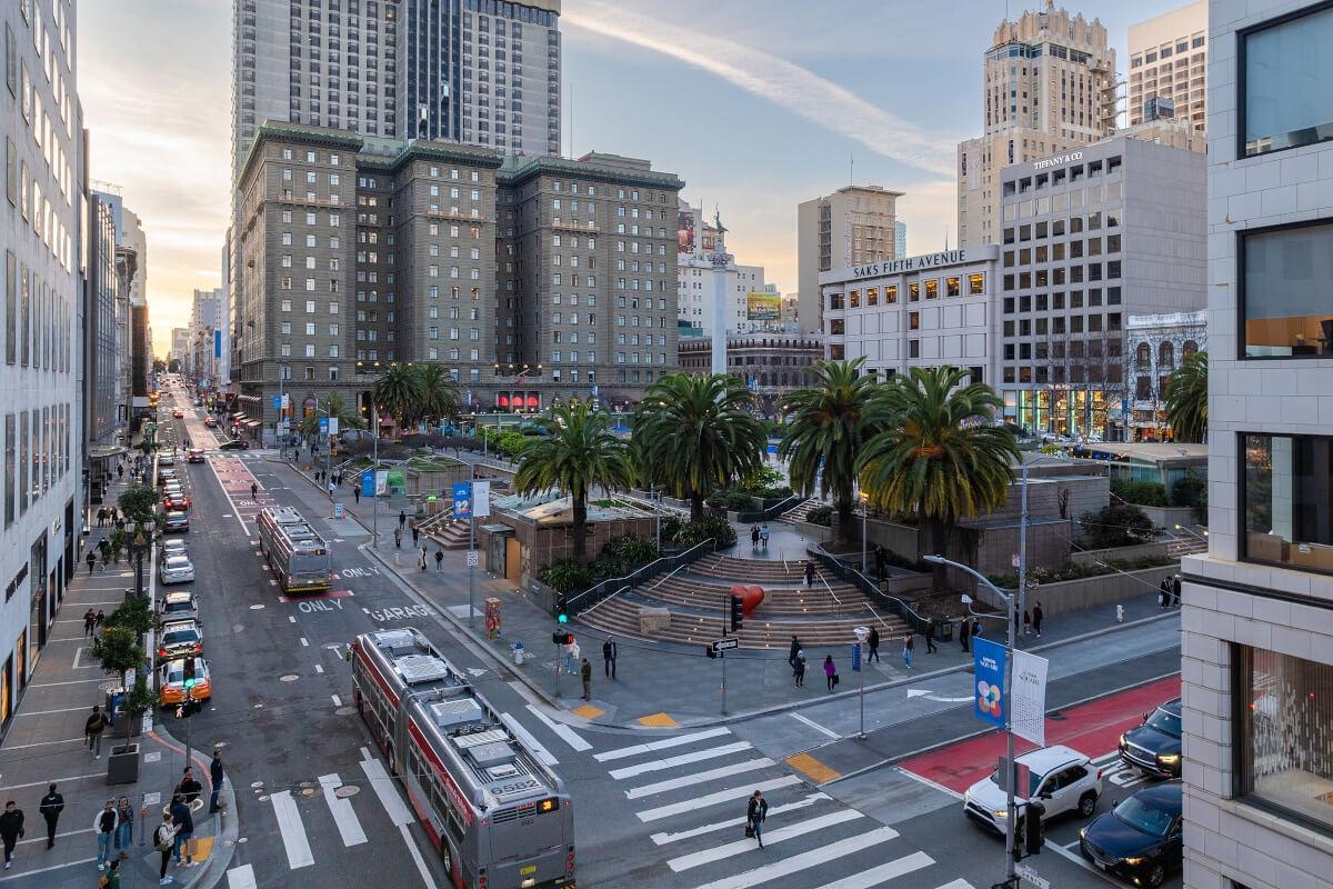 Downtown San Francisco is a bustling city center with corporate buildings and high-end stores.