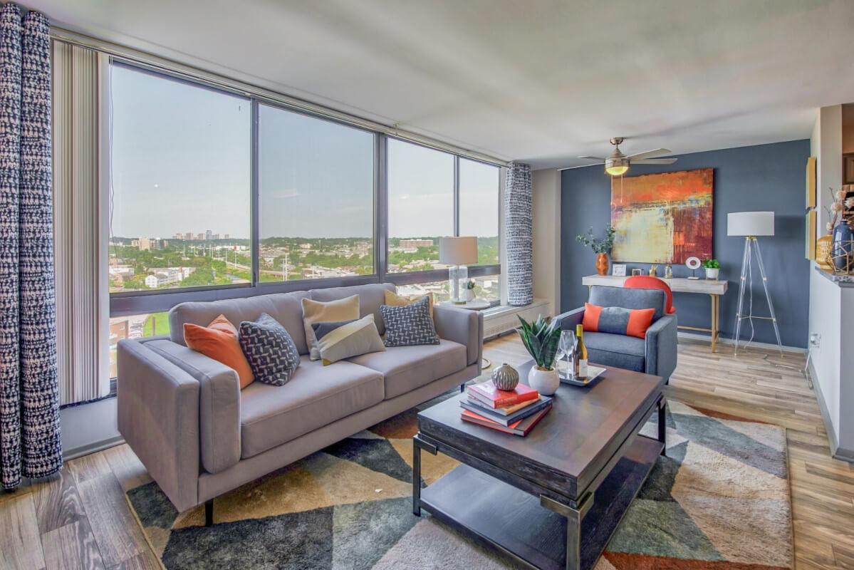 Apartment living room in a high-rise with large windows