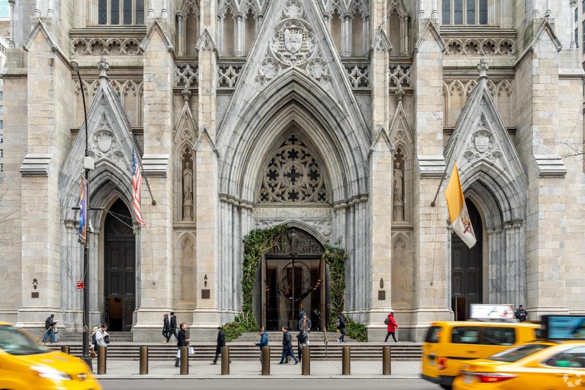 New York City’s St. Patrick’s Day Parade passes St. Patrick’s Cathedral in Midtown Manhattan.