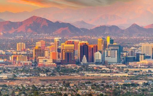 Phoenix, Arizona skyline and mountains.