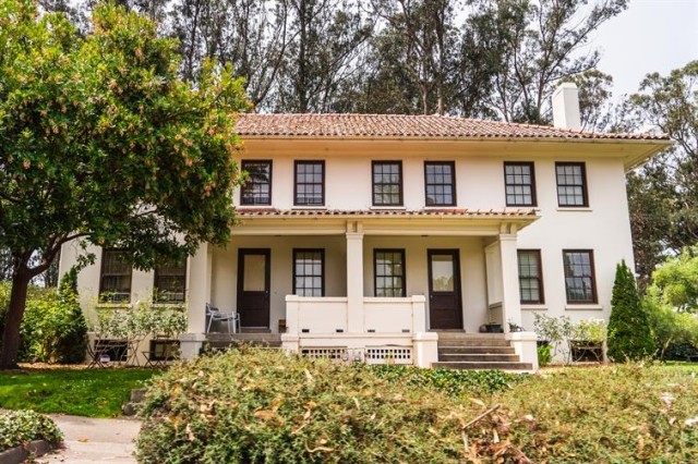 A street view of a beautiful duplex home 