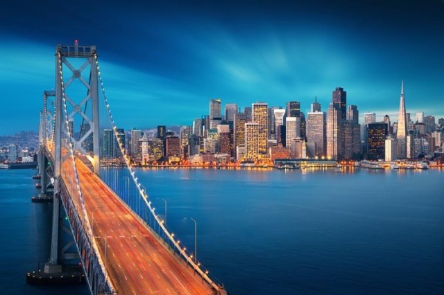 View of the Golden Gate Bridge and San Francisco at night.