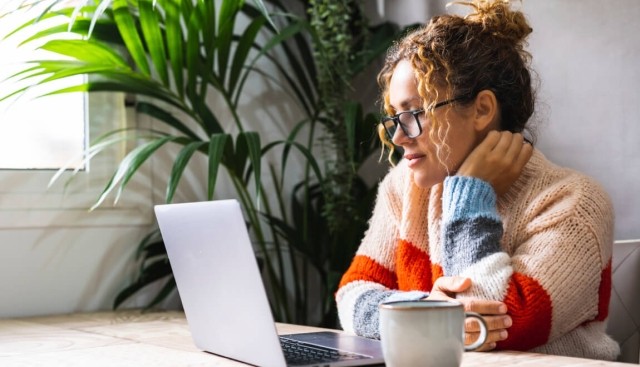 A women using her laptop. 