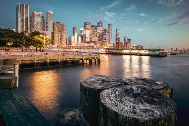 New york skyline during the evening from over the hudson river.