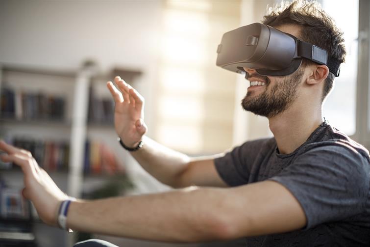 A man using a virtual reality headset