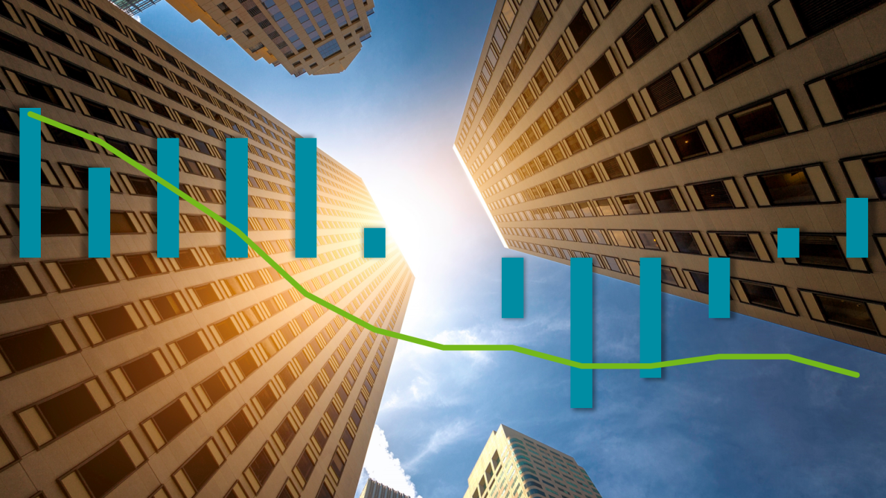 Graph of declining growth superimposed over tall buildings