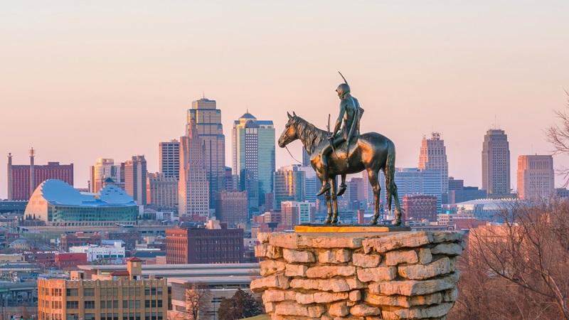 The Scout statue looks over the Kansas City skyline