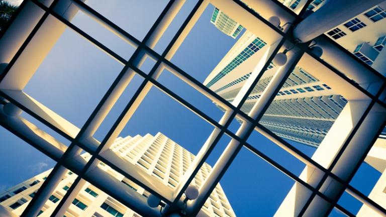 Looking up at buildings