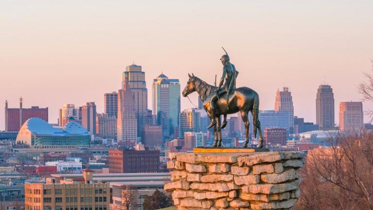 The Scout statue looks over the Kansas City skyline