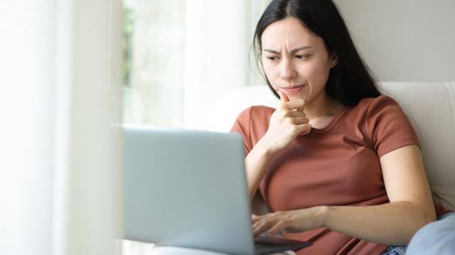 Renter looks at laptop skeptically