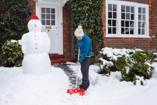 Person shoveling snow