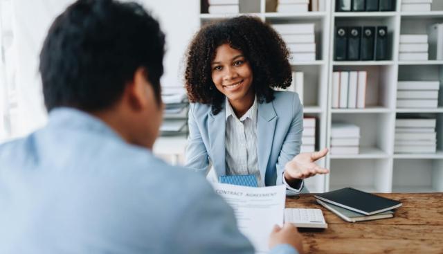 Landlord interviews tenant in a pre-screening interview. 