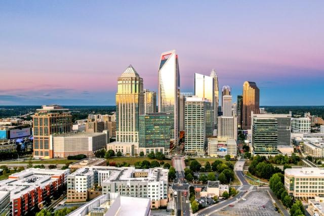 Evening drone shot of the Charlotte, NC skyline.