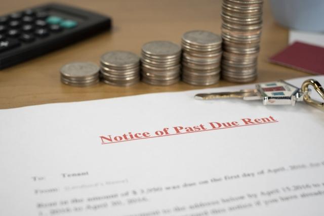 A close-up of a Late Rent Notice letter.