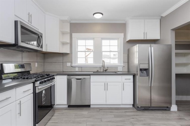 modern kitchen with stainless-steel appliances