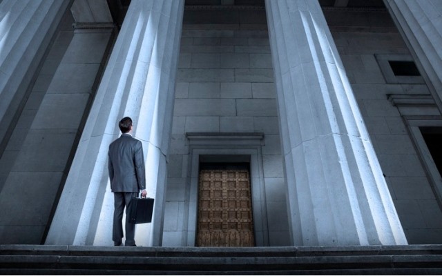 Standing in front of court building