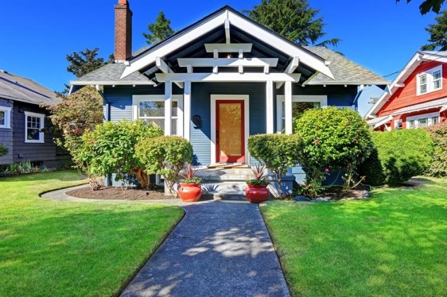 A craftsman style home sitting in the sun