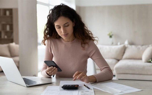 Landlord calculating utility fees.