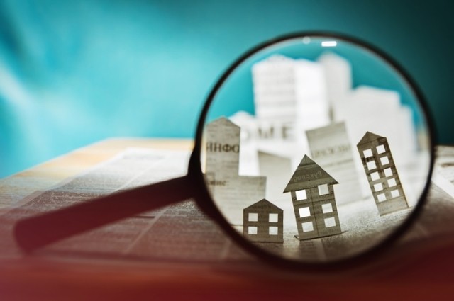 property through magnifying glass