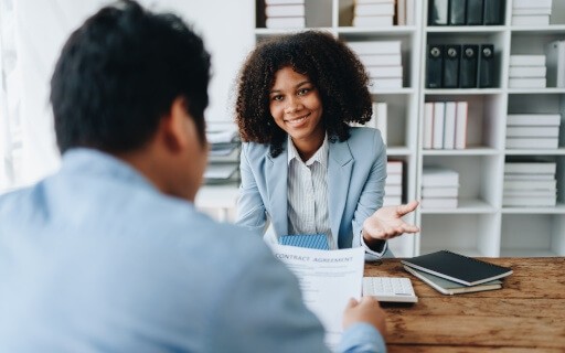 Landlord interviews tenant in a pre-screening interview. 