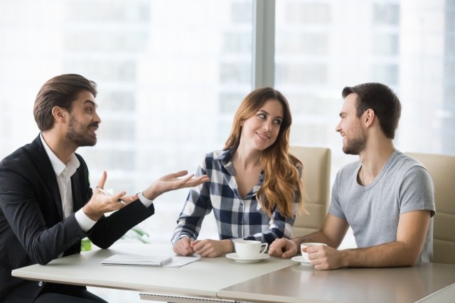 Landlord is negotiating a lease with a couple.